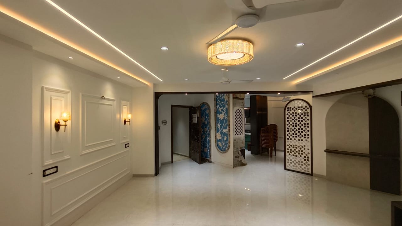 Mint green modular kitchen designed by Vasundhara Atelier